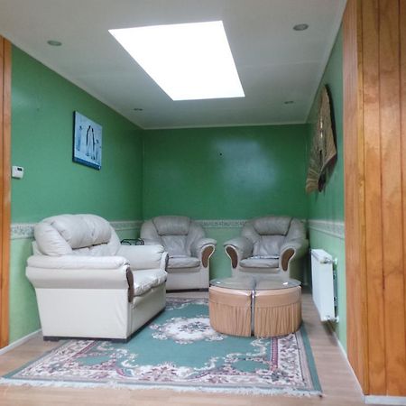 بويرتو ناتالز Hostal South Wind I المظهر الخارجي الصورة