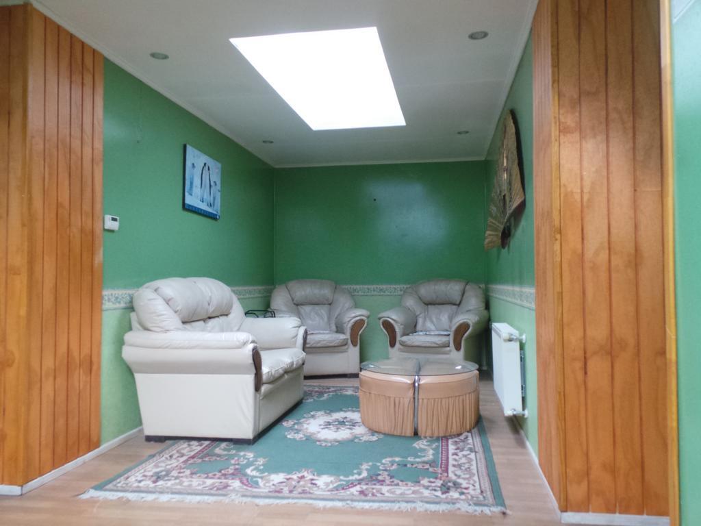 بويرتو ناتالز Hostal South Wind I المظهر الخارجي الصورة